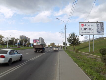 Авиаторов, напротив Ауди центра
