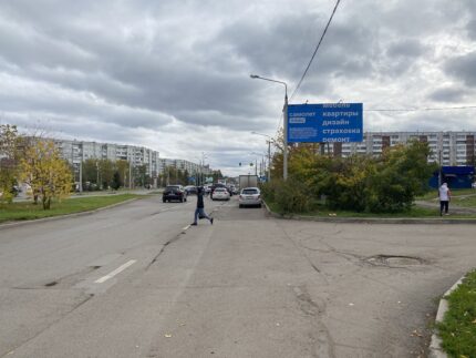 Комсомольский, со стороны здания по ул. 9 мая 12